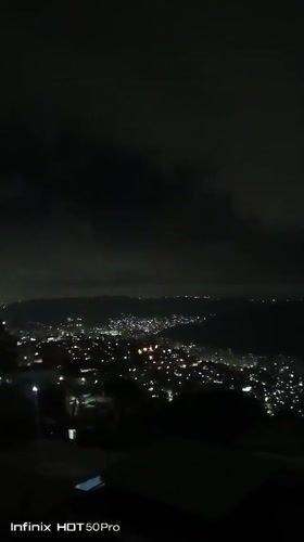 Nighttime Caracas panoramas and indoor scenes documented by witness