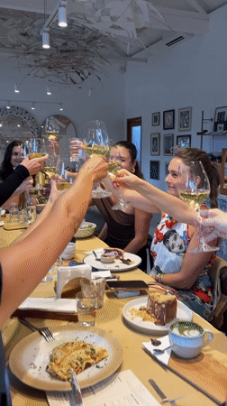 Women's wine brunch gathering documented at Ubud restaurant