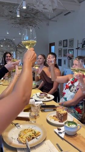 Women's wine brunch gathering documented at Ubud restaurant