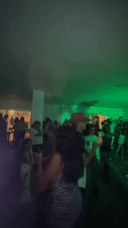 Late-night party and costumed performer at Margarita Village, Porlamar