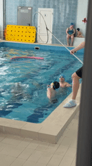 Children's swimming lessons and activities documented at indoor pool facility