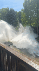 Sunny day brings crowds to amusement park water rides