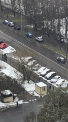 Light snowfall observed on Moscow street during early spring