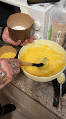 Home baker prepares cupcakes in Saint Petersburg kitchen