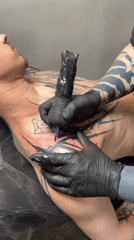 Tattoo session documented at Moscow studio