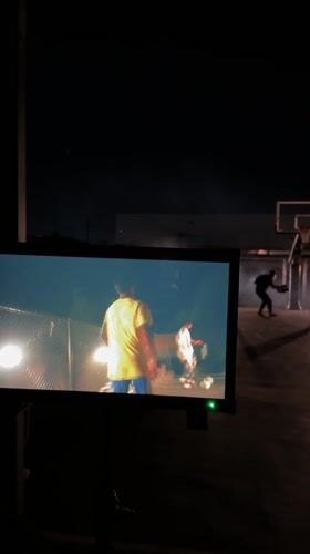 Night film shoot captures soccer players on LA basketball court