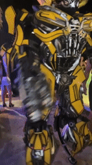 Person spotted in Bumblebee Transformer costume at nighttime gathering