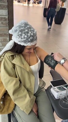 Woman gets blood pressure checked, visits pier in Belgrade