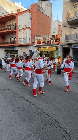Traditional festival parade fills the streets of Blanes