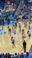UCLA cheerleaders perform at packed Pauley Pavilion basketball game