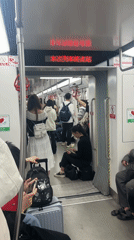 Morning commuters ride Chongqing subway to Chaotianmen station