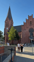 Rostock's Gothic brick church on a sunny Altstadt afternoon