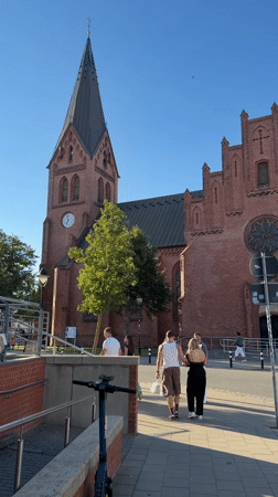 Rostock's Gothic brick church on a sunny Altstadt afternoon