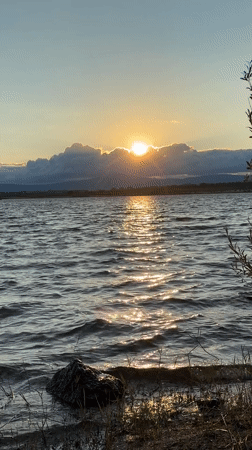 Sunset over a quiet reservoir in Castelo Branco, Portugal