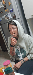 Person smoking in kitchen, Rishon LeZion