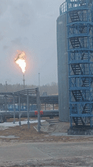 Worker observed at Russian industrial facility during snowy morning