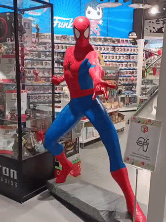 Life-sized Spider-Man statue in Tallinn retail store