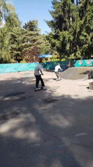 Morning park scenes: Rottweiler resting, youth scootering in Ukraine