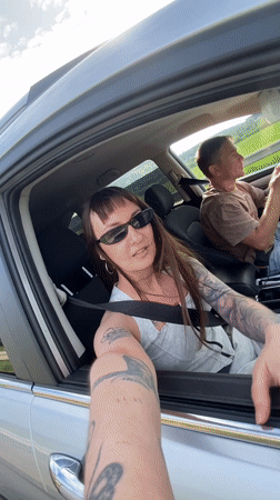 Woman takes selfies in car in Votkinsk, Russia