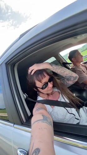 Woman takes selfies in car in Votkinsk, Russia