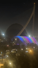 Valencia's City of Arts and Sciences illuminated in rainbow colors