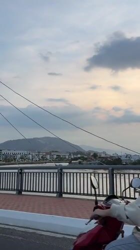 Bridge view captured in Nha Trang showing waterfront cityscape
