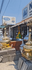 Roadside stop near mosque finial stall, Central Java