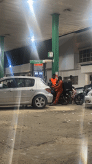 Routine nighttime refueling activity at Abuja gas station
