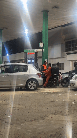 Routine nighttime refueling activity at Abuja gas station