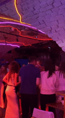 Evening social gathering captured at Saratov nightlife venue