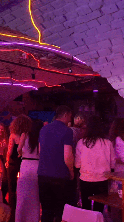Evening social gathering captured at Saratov nightlife venue