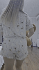Woman documents casual moments with teddy bear in Sevastopol home