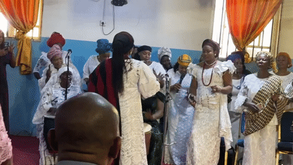 Traditional worship gathering in a Narayi community hall