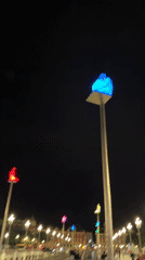 Colorful illuminated sculptures light up Place Masséna at night