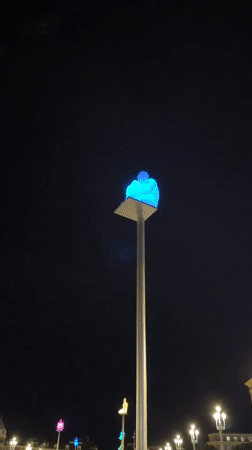 Colorful illuminated sculptures light up Place Masséna at night