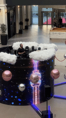 DJ performs at decorated shopping mall in Belgrade