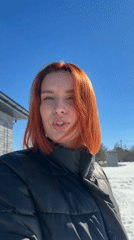 Woman films outdoor selfies with dog in snowy Chaykovsky
