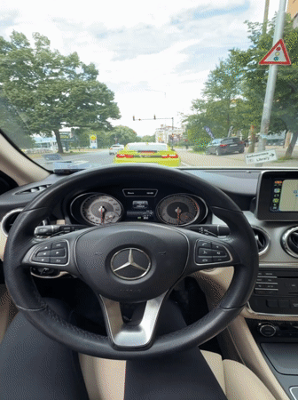 Mercedes driver waits behind green Camaro at Bulgarian traffic light