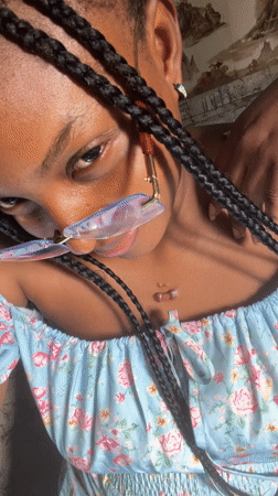 Woman takes selfies in Adankolo, Nigeria