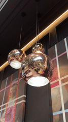 Morning cafe scenes captured: pendant lights and latte art