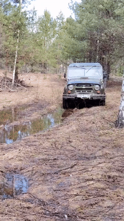 Man celebrates off-road adventure with UAZ vehicle in Markovskii