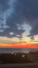 Vibrant sunset observed over coastal Kunje, Montenegro resort area