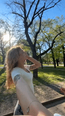 Woman photographed in multiple Sofia park locations during afternoon