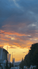 Sunset colors illuminate street scene in Septemvri, Bulgaria