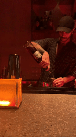 Laid-back bar night in Tel Aviv with drinks, DJ, and pizza