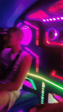 Neon-lit tuk-tuk ride through Kathu streets at night