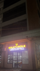 Dar es Salaam retail strip glowing after dark