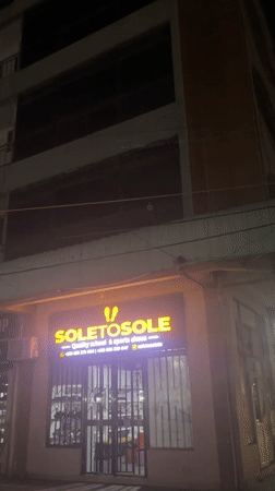 Dar es Salaam retail strip glowing after dark