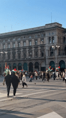 Afternoon pedestrian activity documented in Milan's historic square