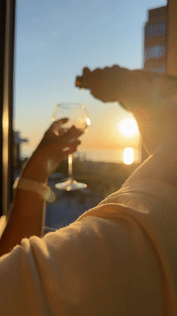 Sunset wine moment captured in Anapa overlooking Black Sea